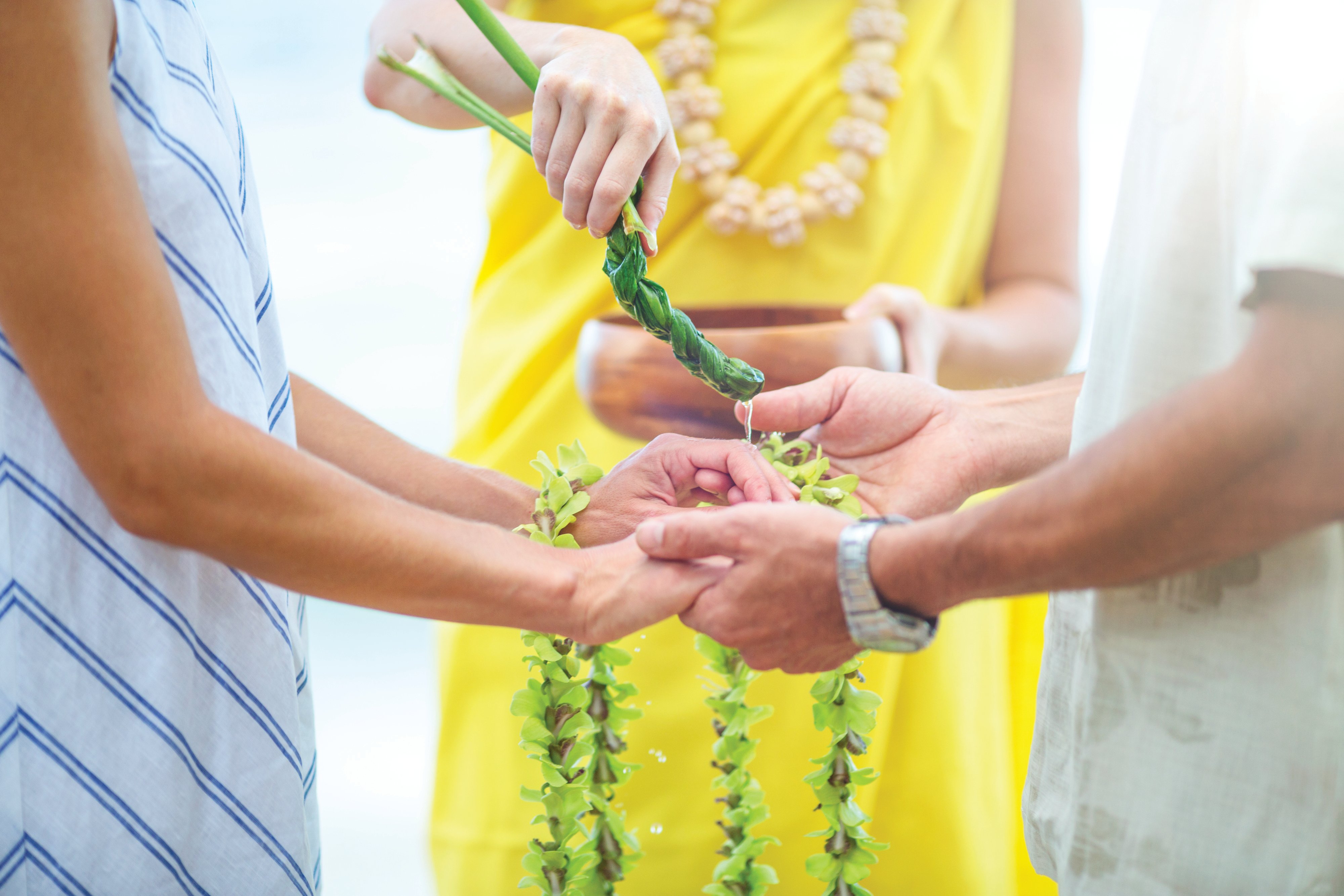 Couple holding hands as part of a vow renewal ceremony